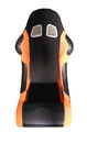 Il nero materiale ed arancia della pelle scamosciata che corrono i sedili, cursore dei sedili avvolgenti di automobili doppio